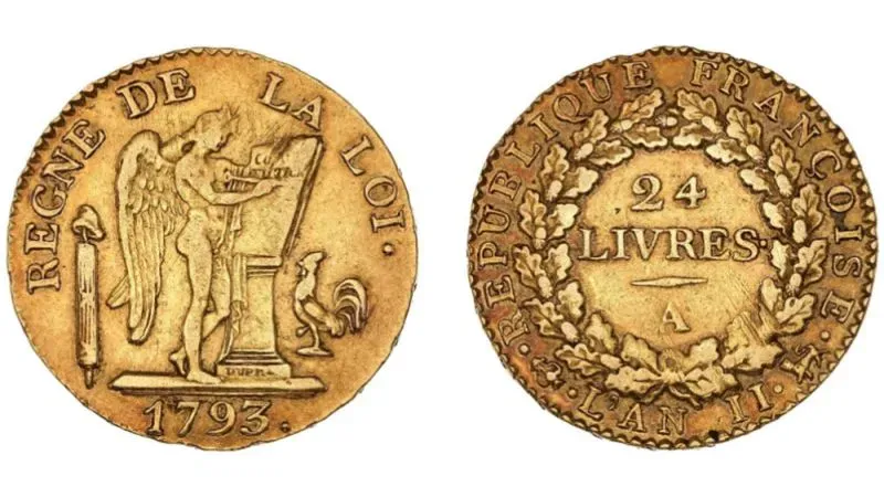 عملات ذهبية تاريخية تعود لعام 1793، تظهر تفاصيل دقيقة مثل النقوش والزخارف، تم اكتشافها في جدار منزل في فرنسا.