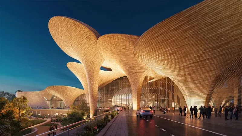 تصميم معماري حديث في طشقند، يتميز بأشكاله المبتكرة والمواد الطبيعية، يعكس التطور الثقافي للمدينة.