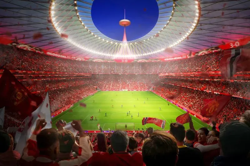 تصميم مستقبلي لملعب مانشستر يونايتد الجديد، يظهر مدرجات حمراء وجمهورًا متحمسًا، مع ملعب أخضر في المركز.